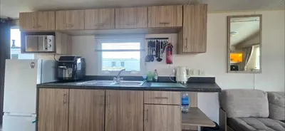 a kitchen with a sink and a counter top at Vanhalla in Heysham