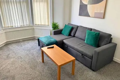 a living room with a couch and a coffee table at 1 Bedroom apartment by Brookland Stays Serviced Accommodation & Short Lets in Blackpool in Blackpool