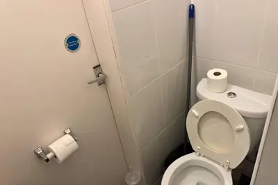 a small bathroom with a toilet and a roll of toilet paper at 1 Bedroom apartment by Brookland Stays Serviced Accommodation & Short Lets in Blackpool in Blackpool