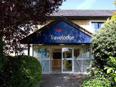 a tapseoteeper sign on the front of a building at Travelodge Burton M6 Northbound in Holme