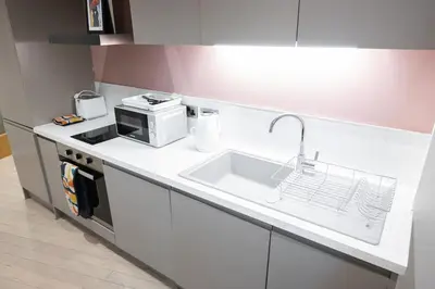 a kitchen with a sink and a microwave at Luxury Studio Apartment in Liverpool City Centre in Liverpool