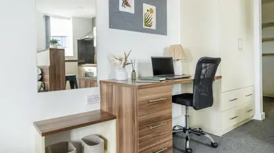 an office with a desk with a computer and a chair at For Students Only Windsor Court in Liverpool in Liverpool