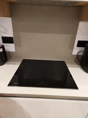 a black stove top oven in a kitchen at Kashkana Haven - Blackburn in Cherry Tree