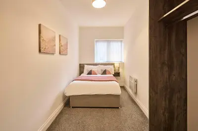 a small bedroom with a bed in a room at Host & Stay - Showtime Studio in Blackpool