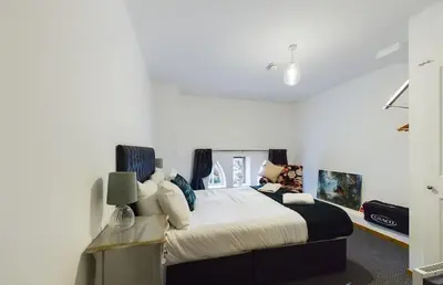 a bedroom with a large bed in a room at Luna Church 5 Blackpool in Blackpool