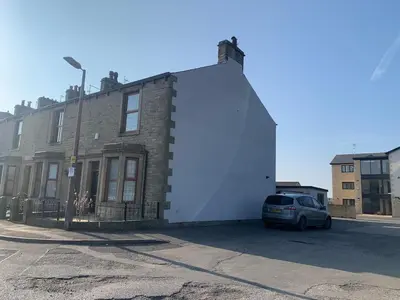 a car parked in front of a building at Design-inspired, Stunning Clitheroe Home in Clitheroe