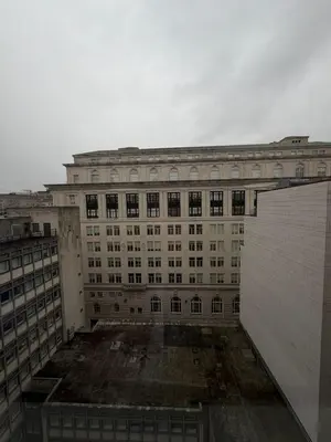 a large building with a lot of windows at City View Studio Apartment Liverpool by StaySavvy Accommodation in Liverpool
