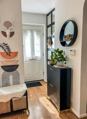 a room with a black dresser and a mirror at Preloved stylish home Wi-Fi Double driveway in Kirkby