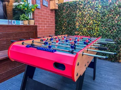a ping pong table with lots of balls on it at Homely house Free parking WIFI Close to centre&anfield in Liverpool