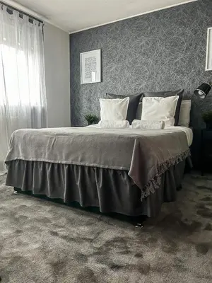 a bedroom with a large bed in a room at Homely house Free parking WIFI Close to centre&anfield in Liverpool