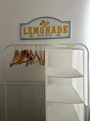 a white refrigerator with a sign that reads leonardadeaho sold here at Music touch house Free Parking WIFI Close to Anfield stadium in Liverpool