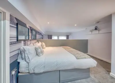 a bedroom with a large bed in a room at Premium Central Liverpool Apartment in Liverpool