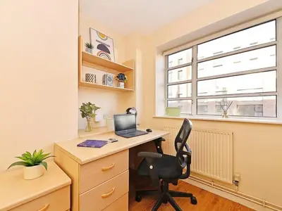 an office with a desk with a laptop computer on it at For Students Only St Andrews Gardens in Liverpool in Liverpool