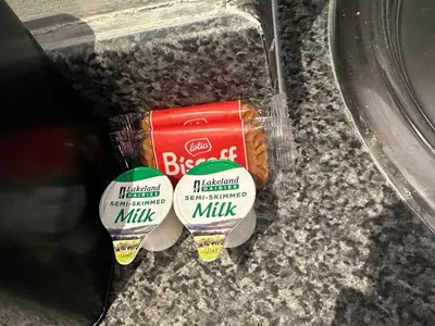 a packet of peanut butter in a container on a counter at Modern Central Flat - Business and Leisure Stays in Preston