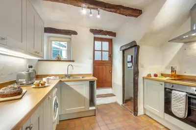 a large kitchen with a sink and a stove at 2 Bed in Lindale oc-c34128 in Lindale