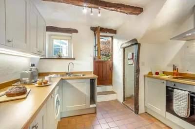 a kitchen with a sink and a dishwasher at 2 Bed in Lindale oc-c34128 in Lindale