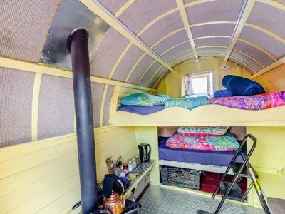 a room with two bunk beds in a trailer at Harans Vardo - Uk42959 in Altham