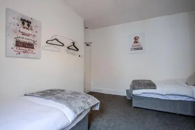 a bedroom with two beds in a room at Blackpool Retreat Group Stays in Blackpool