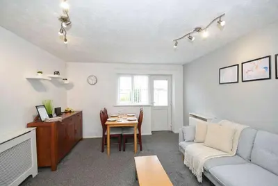 a living room with a couch and a table at Convenient 2 Bedroom Apartment in Preston w WiFi in Preston