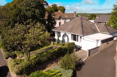 an aerial view of a white house with a yard at Luxury 3-Bedroom, 3-Bath Home in Dalton-in-Furness in Dalton in Furness