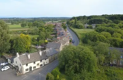 an aerial view of a small village with a road at Couples - Retreat Dog Friendly in Appley Bridge