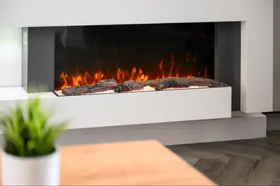 a fireplace in a living room with flames in it at Modern & Stylish Stay in the Heart of St Hubert in Great Harwood