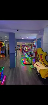 a room with many different types of arcade games at Seaside Arizona in Morecambe