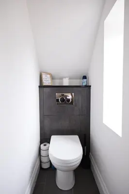 a small bathroom with a white toilet in a room at Westhoughton 3 Bedroom House - Free Parking in Westhoughton