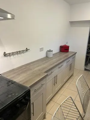 a kitchen with a wooden counter top in a room at Beautiful 3 bedroom home, Dorrington Terrace in Lancaster