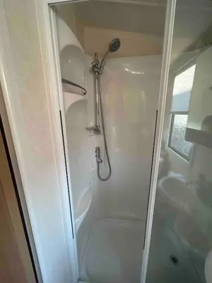 a shower stall in a bathroom with a shower at Charming Holiday Park Retreat in Morecambe - Family-Friendly Escape in Morecambe