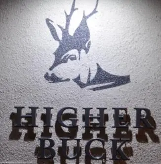 a sign with a picture of a deer on a wall at Higher Buck Inn in Waddington