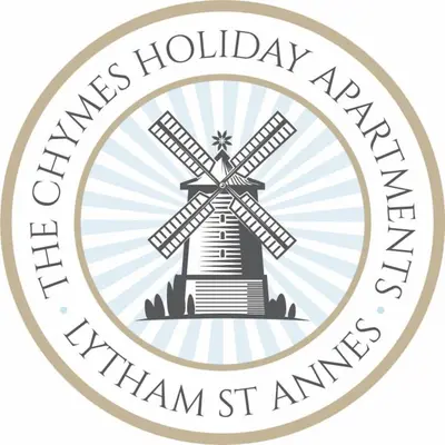 a windmill in a circle with the words happy holidays american stantan at The Chymes Holiday Flats in Lytham St Annes