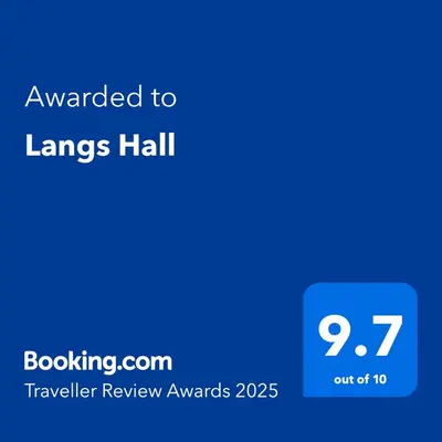 a blue text box with the words awarded to lungs hall at Langs Hall in Leyland