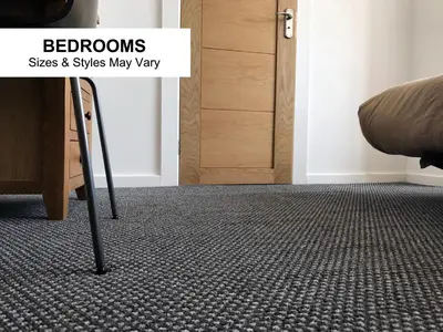 a room with a carpeted floor with a door at Seafront419 By Seafront Collection in Blackpool