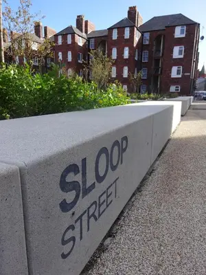 a sign for a sidewalk with the words slop street at Maritime Apartments in Barrow in Furness