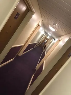 an overhead view of an empty room in an airplane at Purple Roomz Preston South in Preston