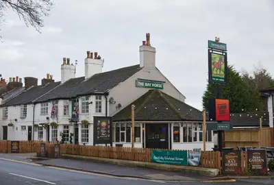 a building on the side of a street at The Bay Horse Hotel in Haydock