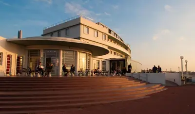 a building with people walking in front of it at The Midland in Morecambe