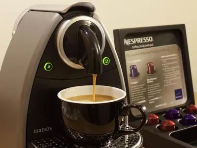 a coffee maker is making a cup of coffee at Novotel Liverpool Centre in Liverpool