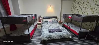 two bunk beds in a small room with at BUKHARI Hotel in Blackpool
