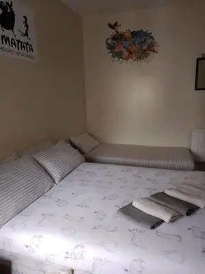 a bedroom with a bed and a bed frame at Meland (Families ONLY B&B) in Blackpool