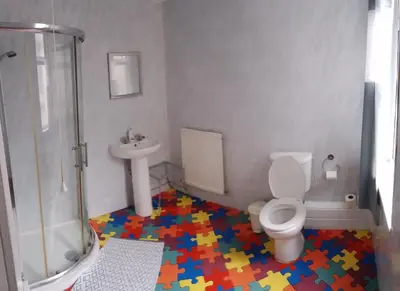 a toy bathroom with a toilet and a sink at Meland (Families ONLY B&B) in Blackpool