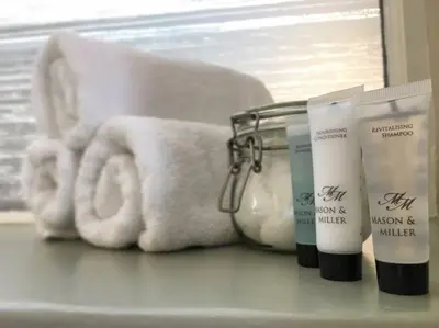 a group of products sitting on top of a counter at The Commodore Inn in Grange Over Sands
