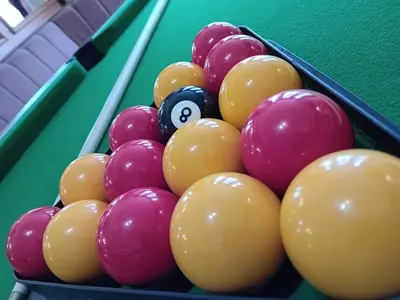 a group of billiard balls on a pool table at The Beckwood Hotel in Blackpool