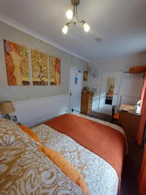 a bedroom with a bed in a room at Westfield House in Blackpool
