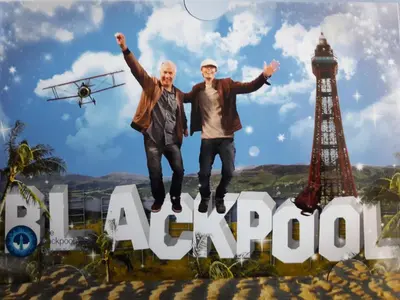 a picture of two men jumping on top of the word vacation at Westfield House in Blackpool