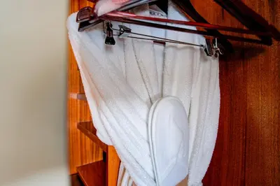 a toilet in a curtain on a door at Atlantic Tower Hotel Liverpool By Sunday in Liverpool