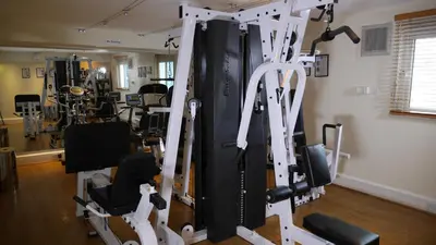 a room with a gym with tread machines at The Big Blue Hotel - Blackpool Pleasure Beach in Blackpool