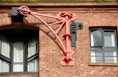 a red object on the side of a brick building at Holiday Inn Express Liverpool-Albert Dock by IHG in Liverpool