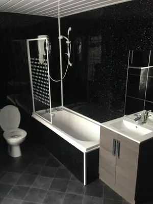 a bathroom with a tub and a toilet and a sink at Yado Hotel in Blackpool